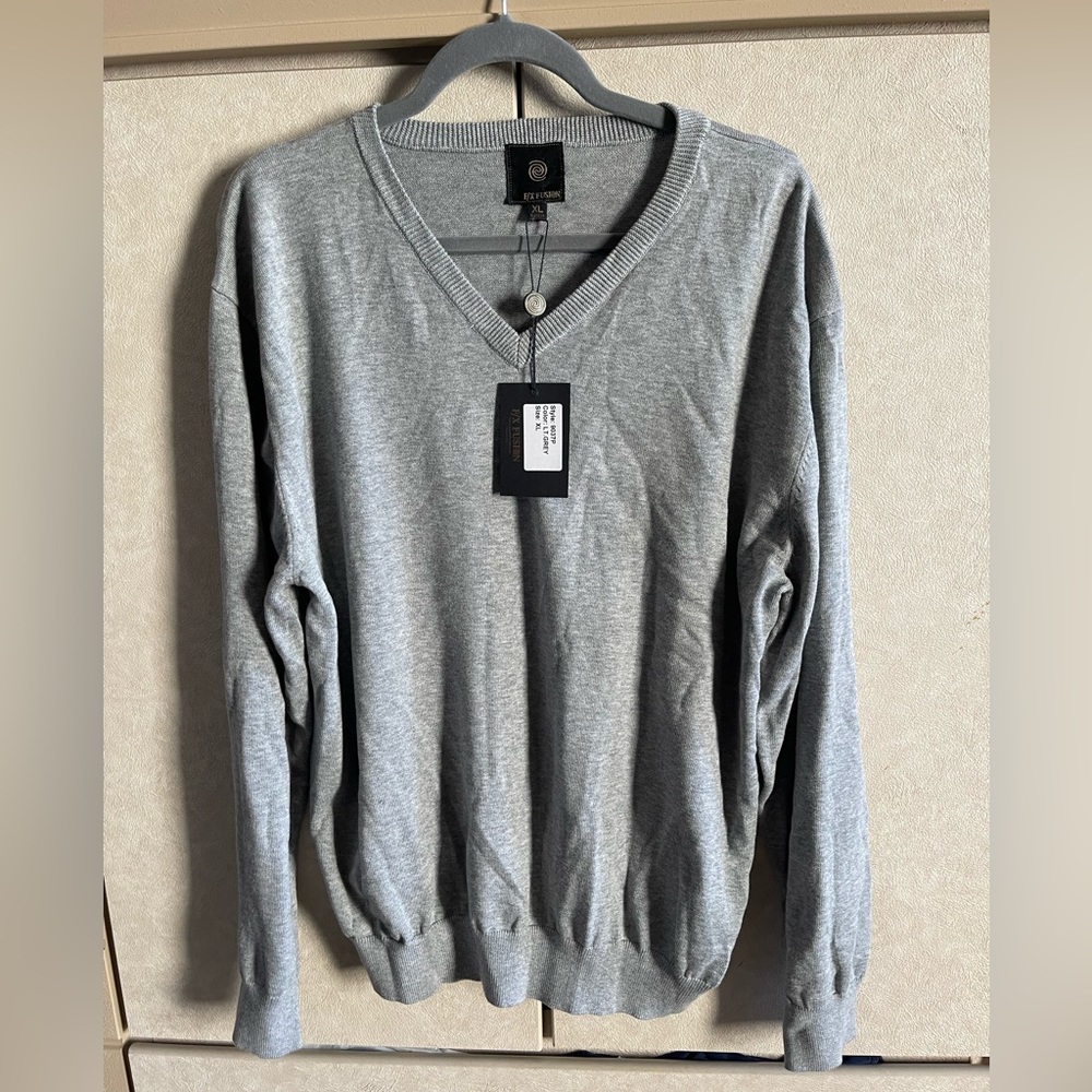 Men’s dress sweater. New with tags. Size XL